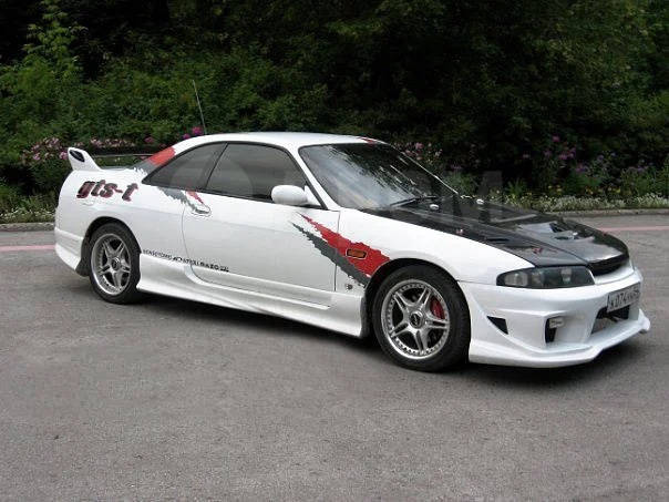 картинка Накладки на пороги для Nissan Skyline R33 купе магазин  StreetTuning 