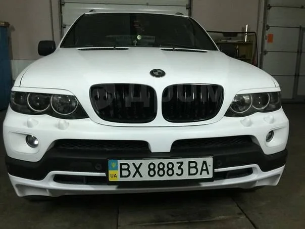 картинка Передняя юбка в стиле 4.8 для Bmw X5 E53 Рестайлинг магазин  StreetTuning 