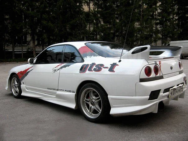 картинка Накладка на задний бампер для Nissan Skyline R33 купе магазин  StreetTuning 