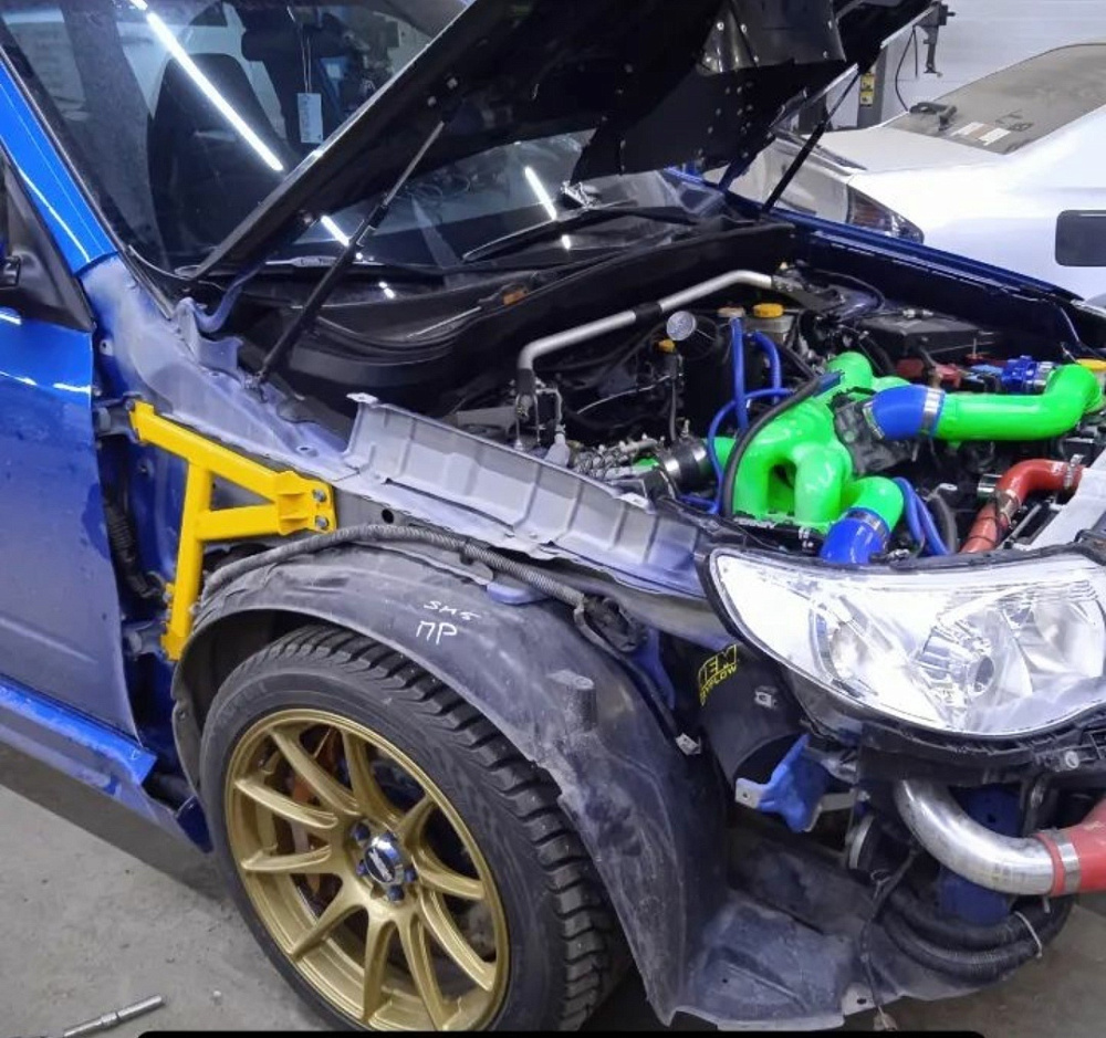 картинка Комплект усилителей под передние крылья для Subaru Forester SH от магазина  StreetTuning