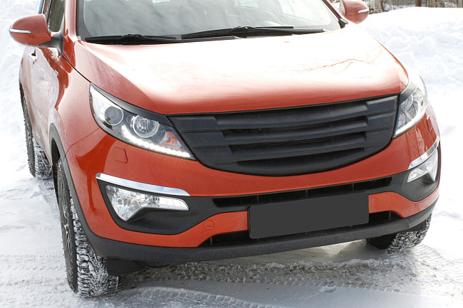 картинка Kia Sportage 2010—2013 Накладки на передние фары (реснички) компл.-2 шт. магазин  StreetTuning 
