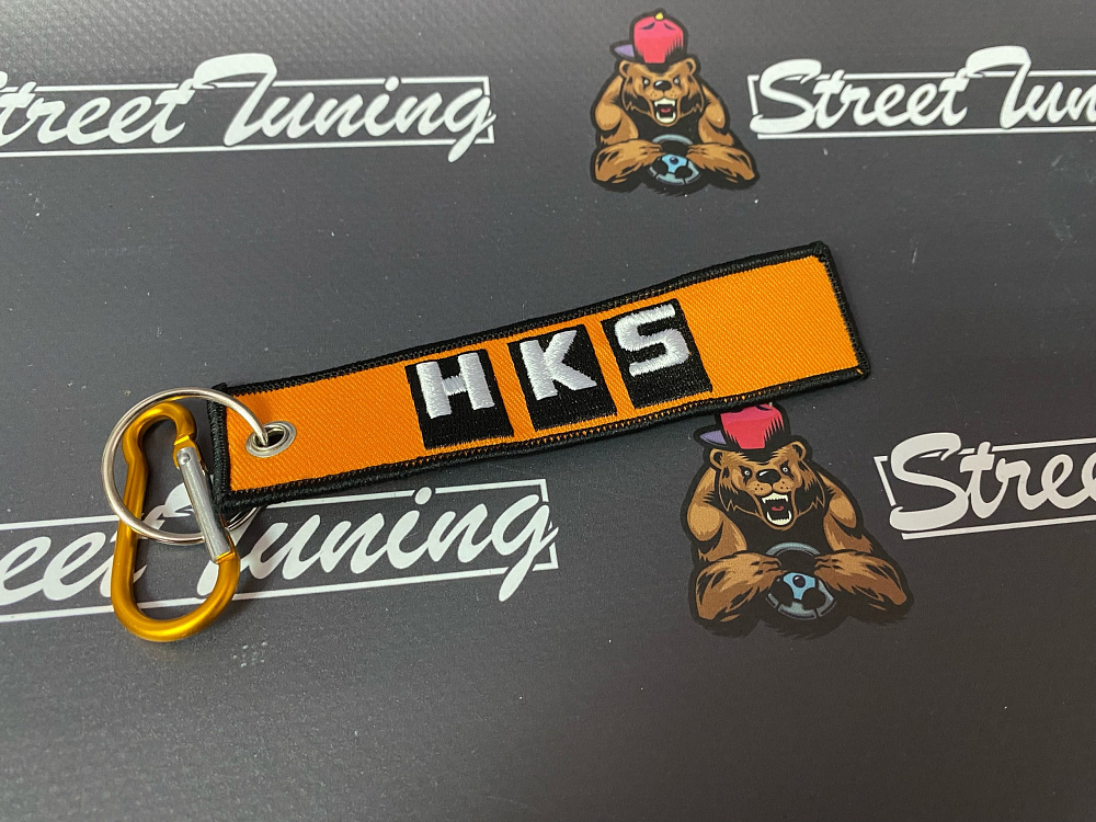 картинка Брелок для ключей HKS "тканевый", оранжевый от магазина  StreetTuning