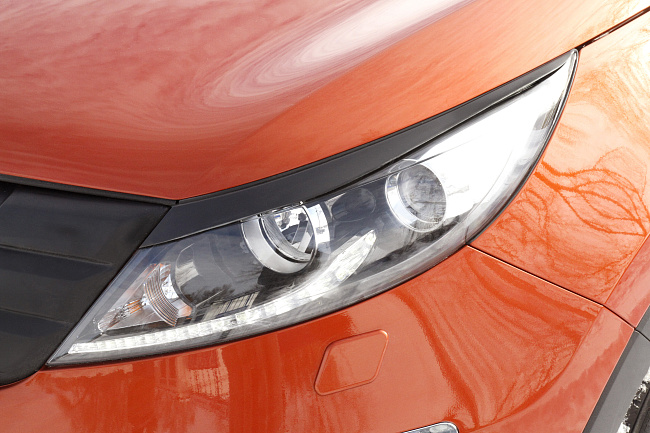 картинка Kia Sportage 2014—2015 Накладки на передние фары (реснички) компл.-2 шт. магазин  StreetTuning 