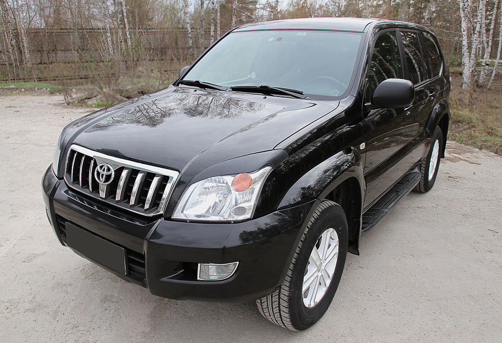 картинка Toyota LC Prado 120 2003—2009 Накладки на передние фары (реснички) компл.-2 шт. от магазина  StreetTuning