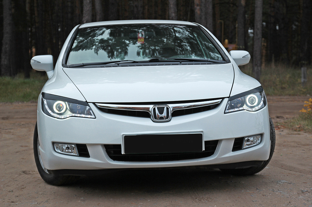 картинка Honda Civic (седан) 2006—2009 Накладки на передние фары (реснички) компл.-2 шт. от магазина  StreetTuning