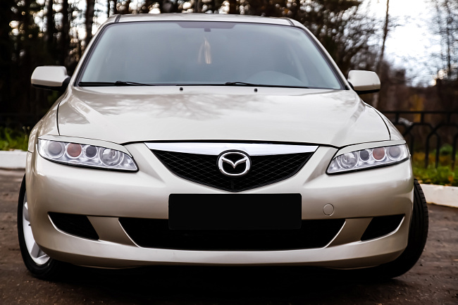 картинка Mazda 6 2002—2007 Накладки на передние фары (реснички) компл.-2 шт. магазин  StreetTuning 