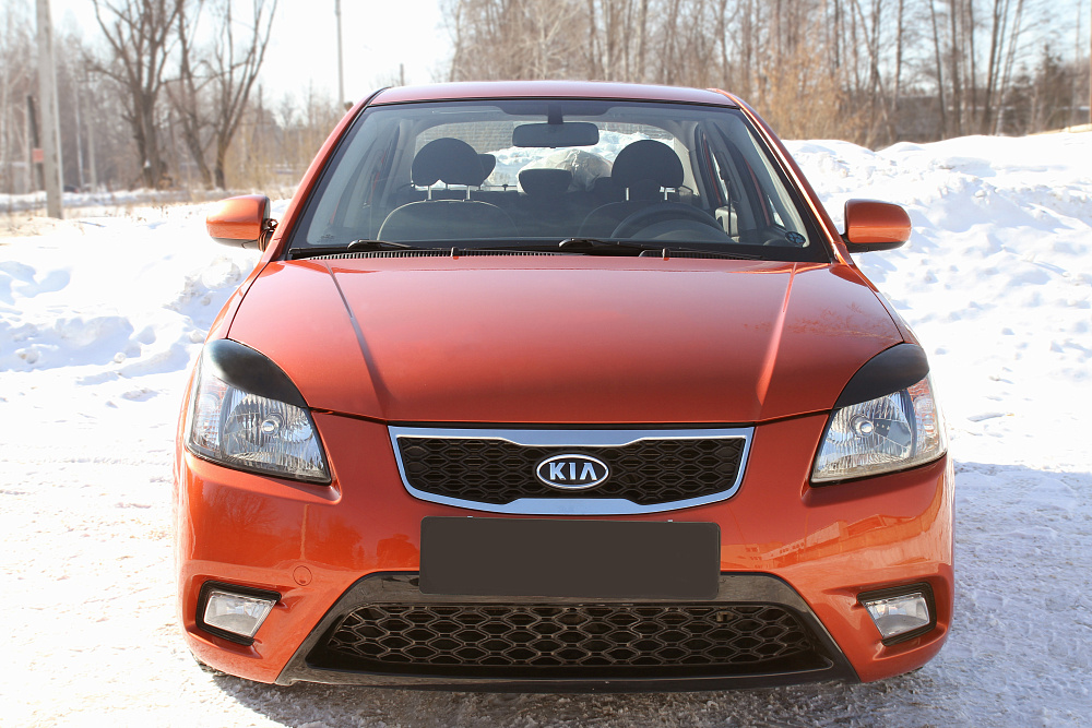 картинка Kia Rio (DE) 2005—2011 Накладки на передние фары (реснички) компл.-2 шт. от магазина  StreetTuning