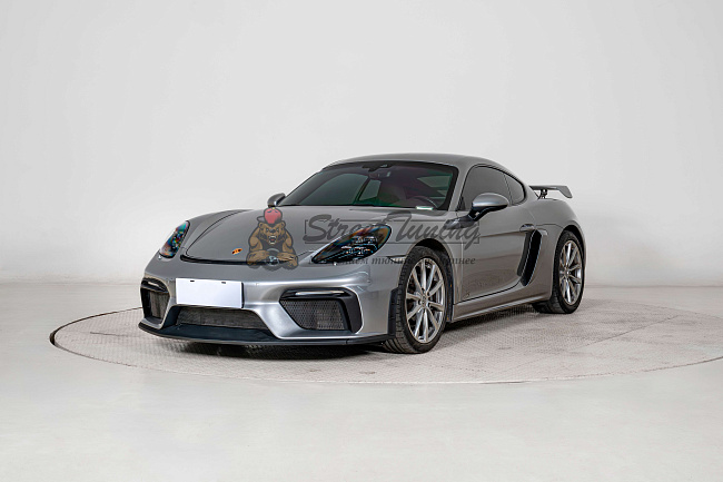 картинка Передний бампер GT4, упрощённая версия, в сборе без ДХО для Porsche 718 Boxster (982) 2017+ магазин  StreetTuning 